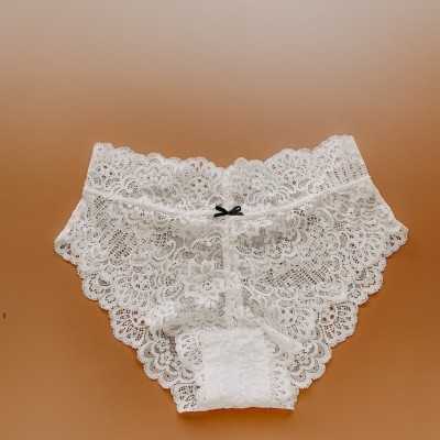 Set trắng vai cánh tiên đính nơ màu đen